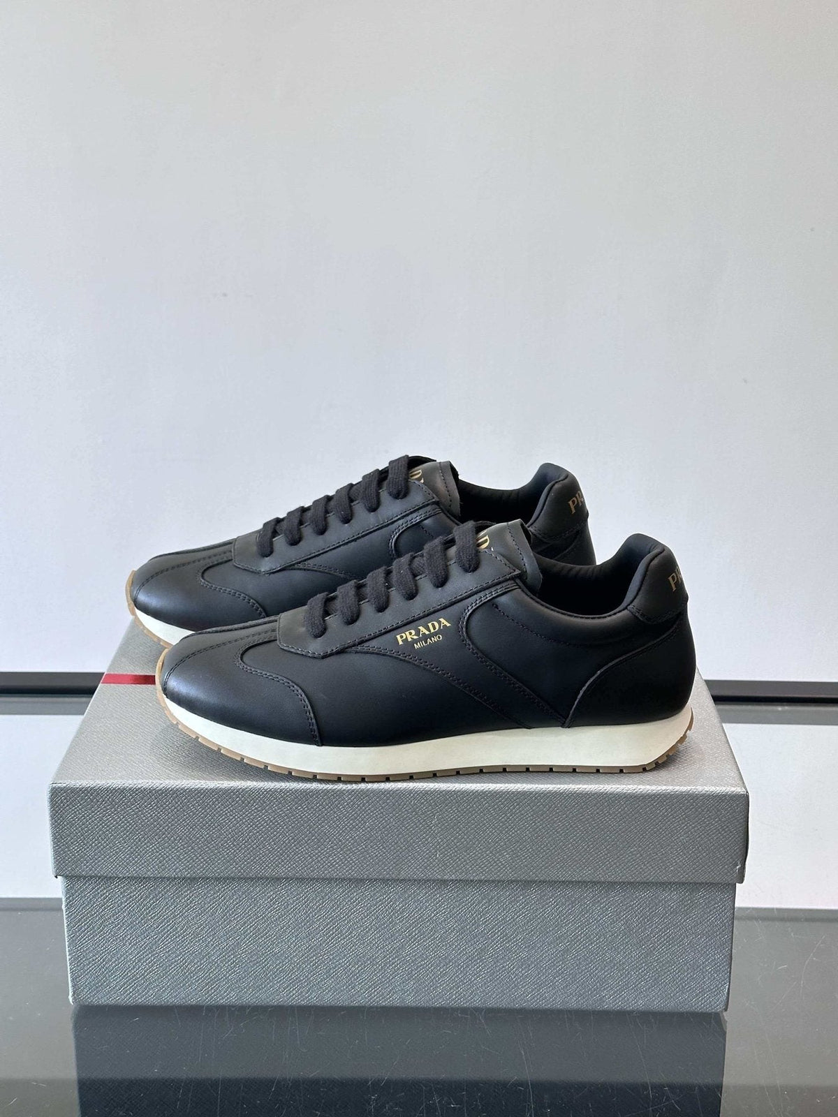 Prada Men's Black Low-Top Sneakers - Black Upper With White And Tan Accents