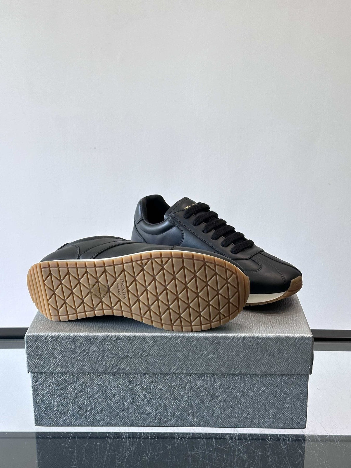 Prada Men's Black Low-Top Sneakers - Black Upper With White And Tan Accents